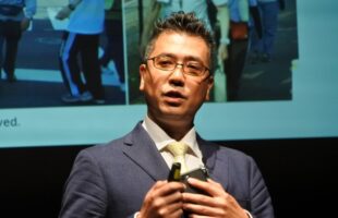 医歩インストラクターの吉澤隆治氏が登壇